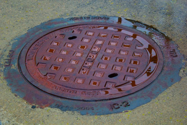 wet man hole cover