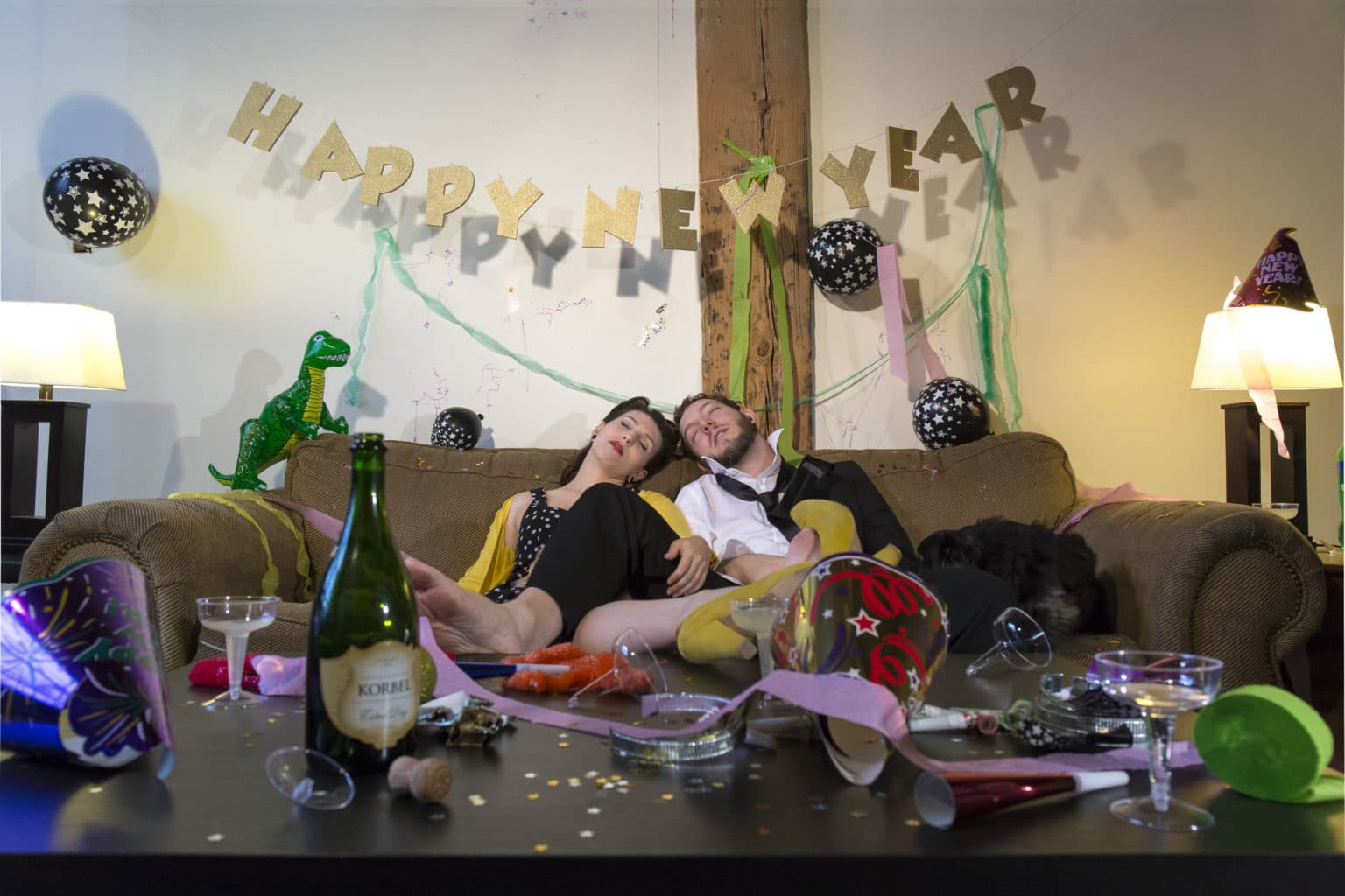 Lauren and Deven in a New Year's Day couch scene.