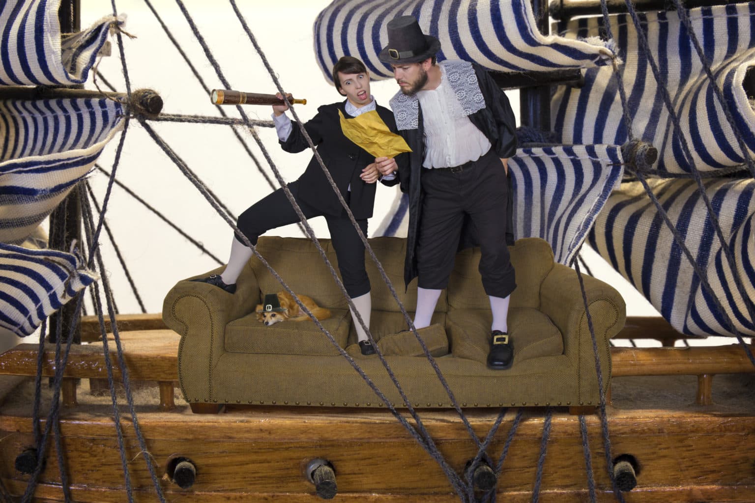 Lauren and Deven in a Mayflower-themed couch scene.