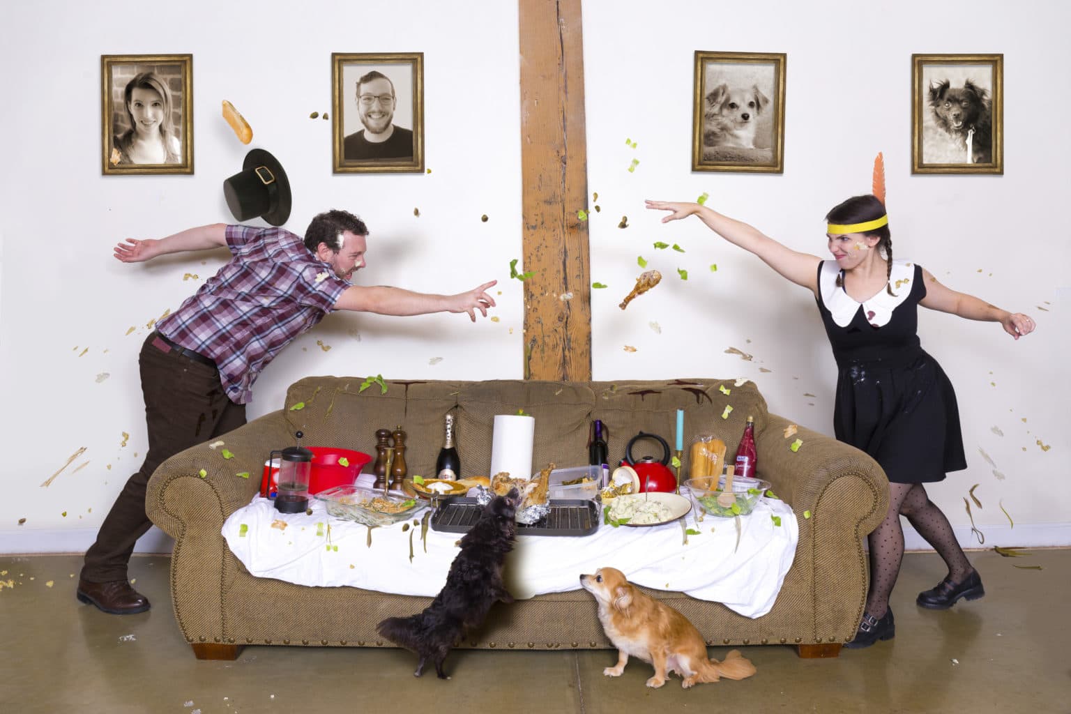 Lauren and Deven in a Thanksgiving food fight around the couch.