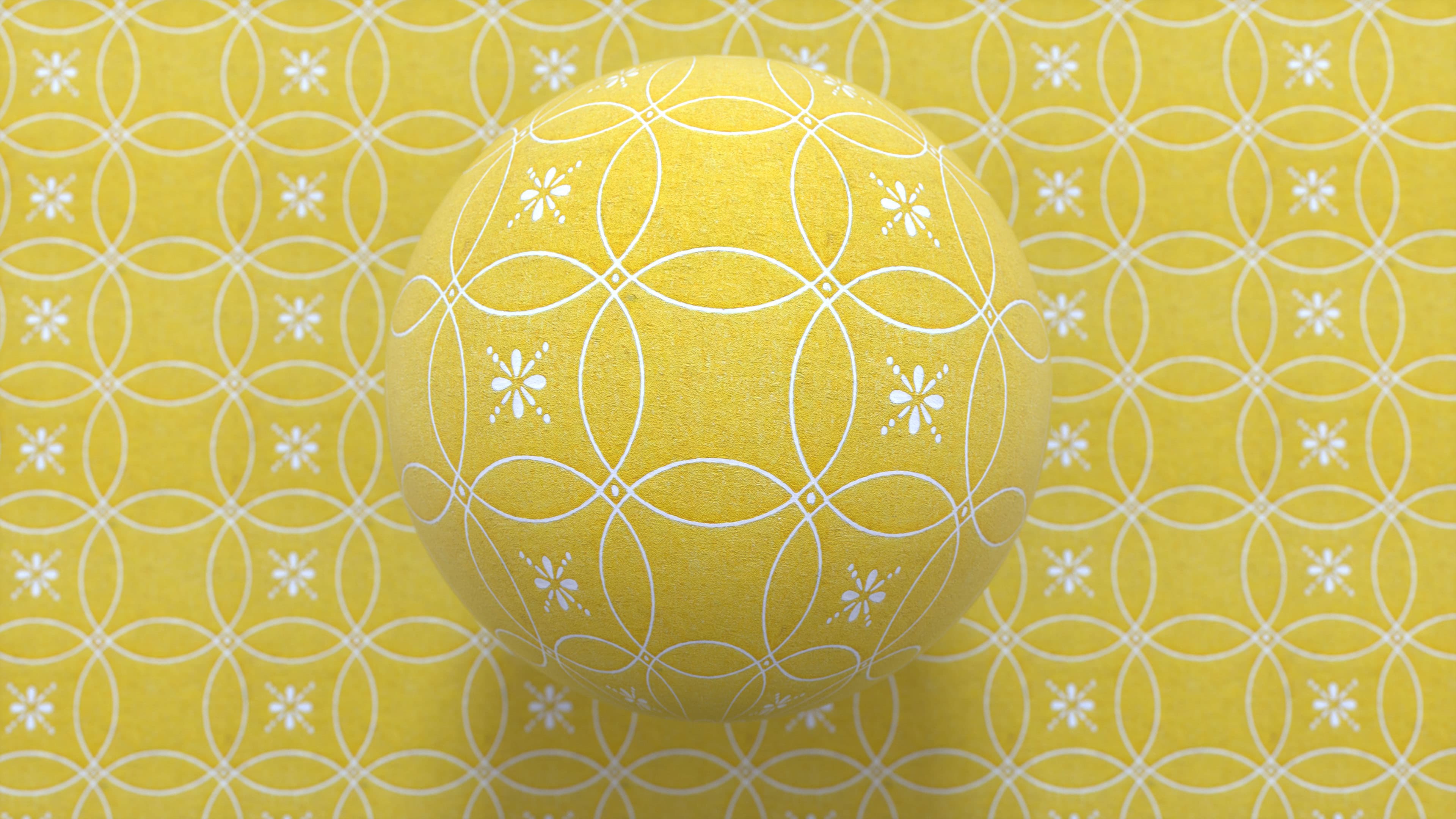 Circle Flourish Yellow material applied to a rendered sphere.