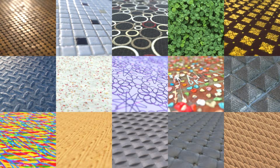 A collection of spheres and flat samples showing colorful fabric, paper, tile, and patterned PBR materials.